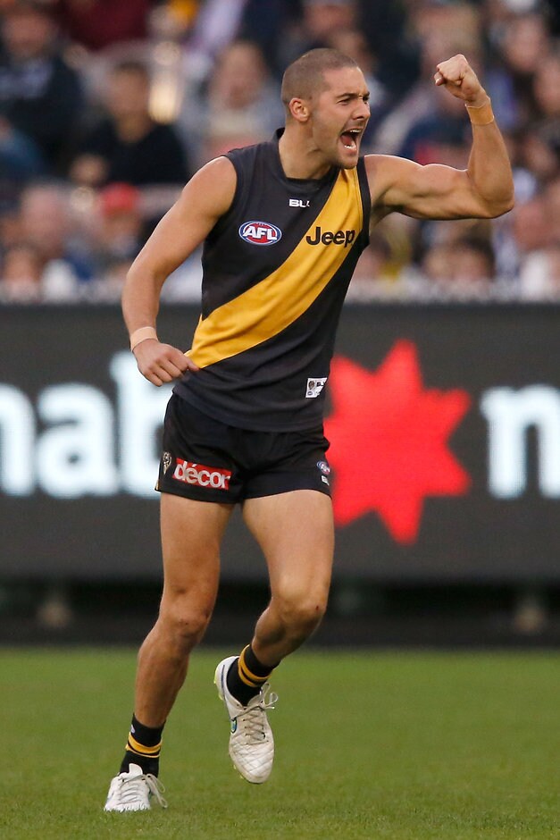 AFL 2015 Rd 07 - Richmond v Collingwood Shaun Grigg of the Tigers celebrates a goal during the 2015 AFL Round 07 match between the Richmond Tigers and the Collingwood Magpies at the MCG, Melbourne on May 17, 2015. (Photo: Darrian Traynor/AFL Media)